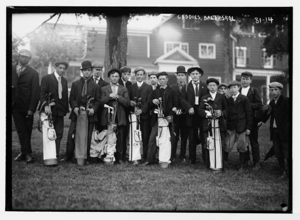 Black and white photo of caddies