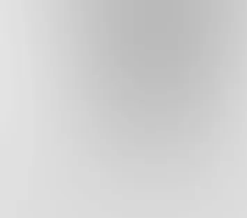 Smooth gradient background transitioning from light gray to darker gray tones.