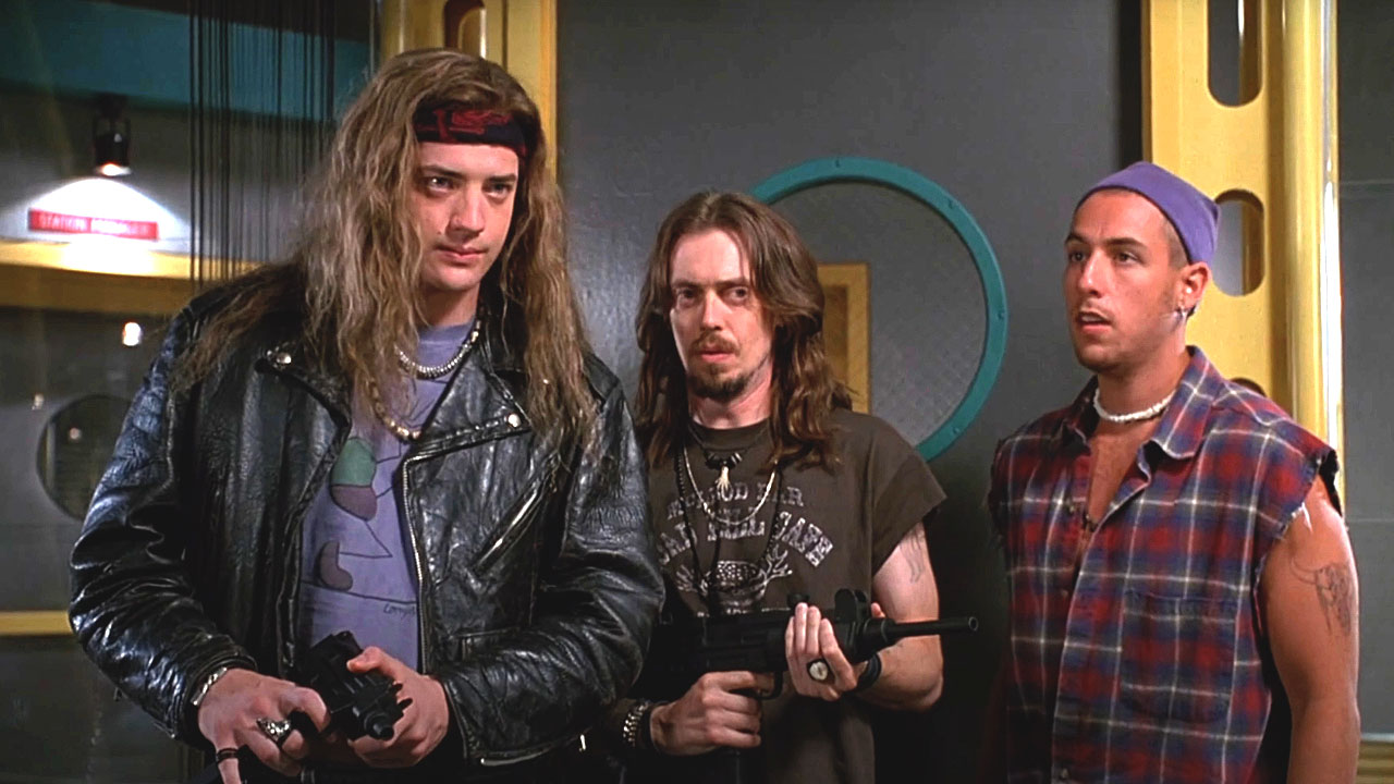 Brendan Frasier, Steve Buscemi, & Adam Sandler comandeer a radio station with toy guns in pursuit of a record contract in Airheads (1994).