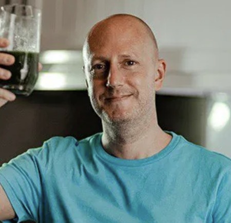 headshot of adam for slider
