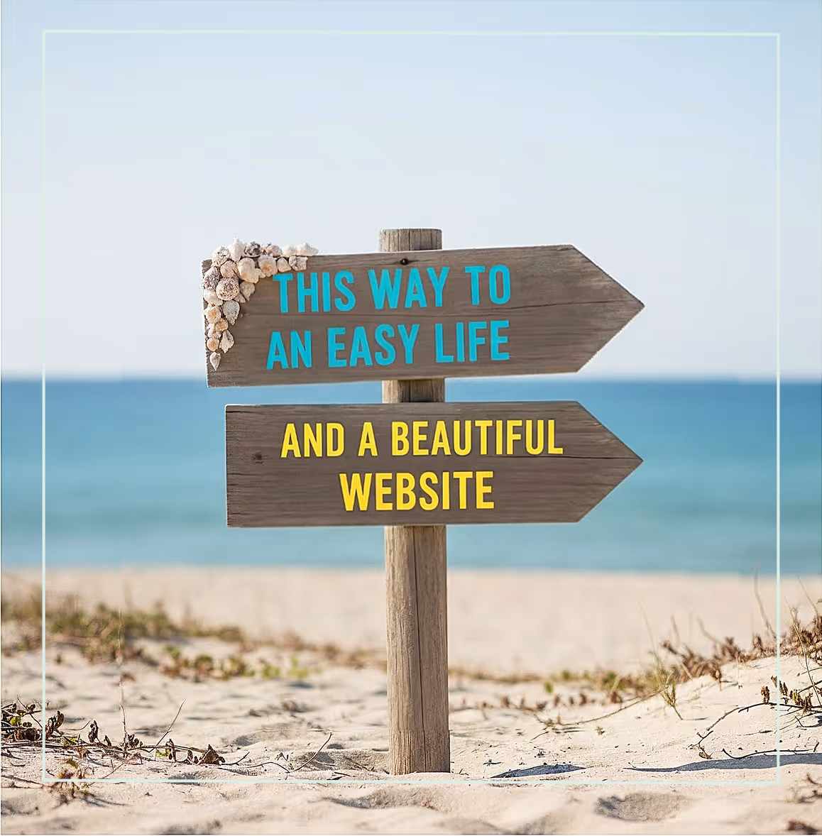 "Wooden beach sign with flowers pointing towards an easy life and a beautiful website against the ocean backdrop."
