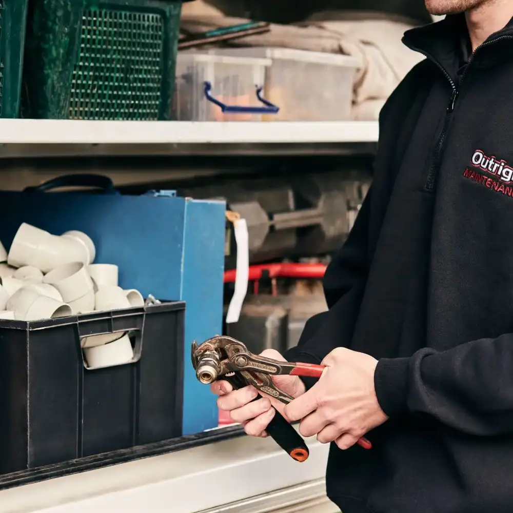 Plumber getting ready to perform plumbing service