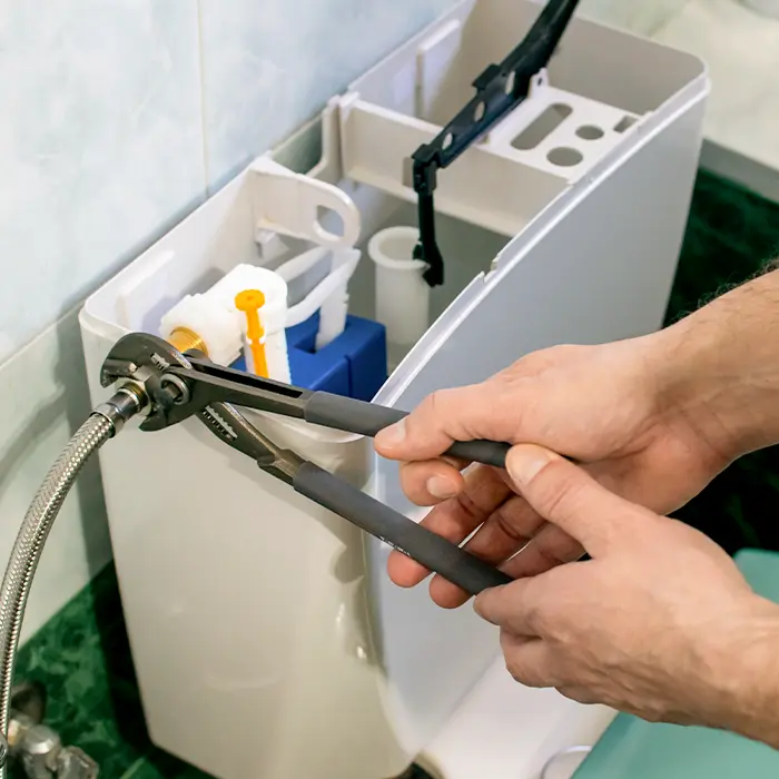 Plumber setting up leak camera detection tool