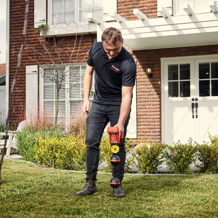 A plumber testing a water tap