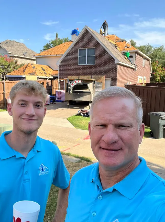 Owner Chad Cross with team member in front of home undergoing roof replacement in Southlake TX