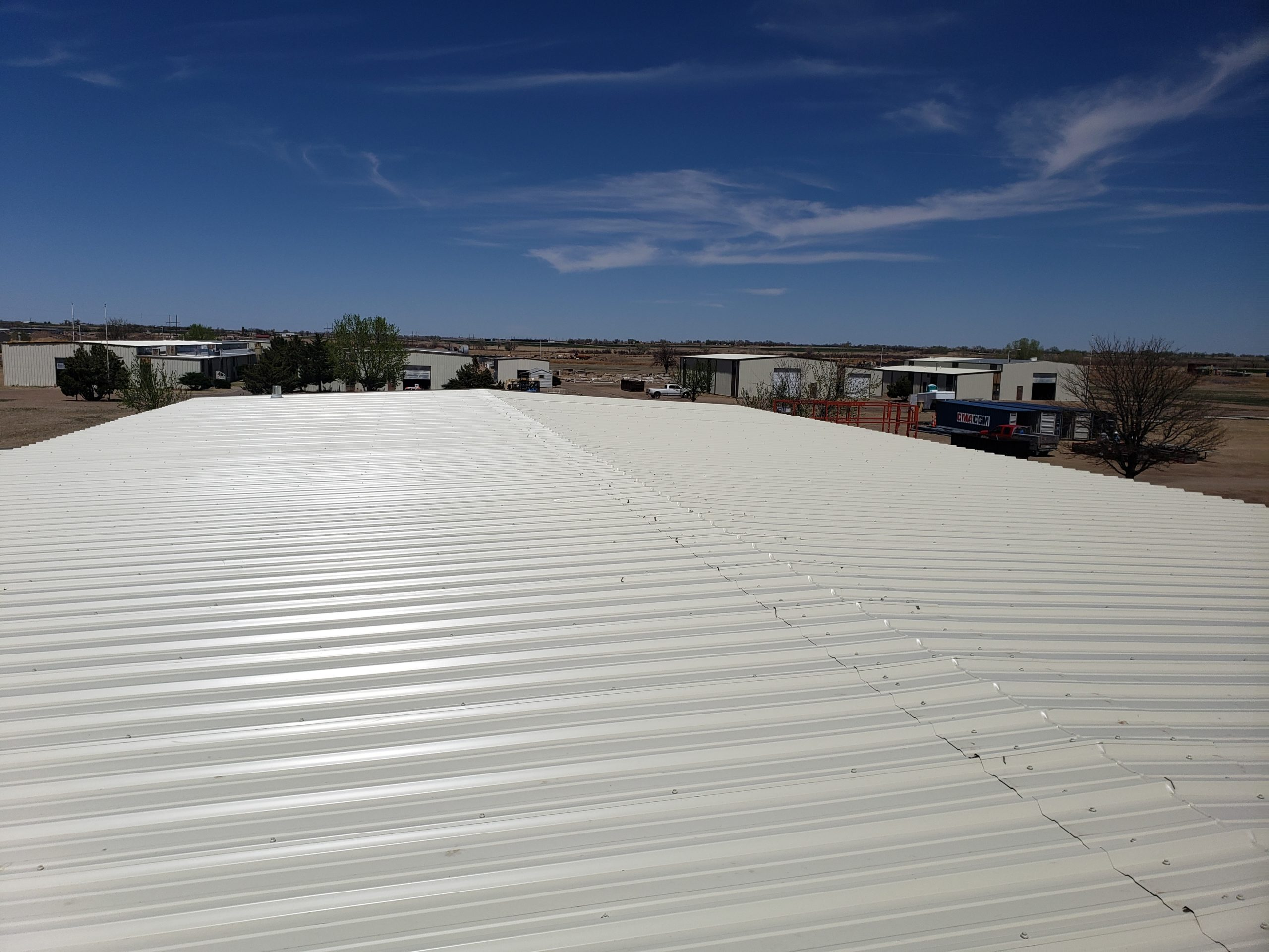 Large white metal roof installation in Southlake, TX, showcasing durability, strength, and expert craftsmanship by CLC Roofing.