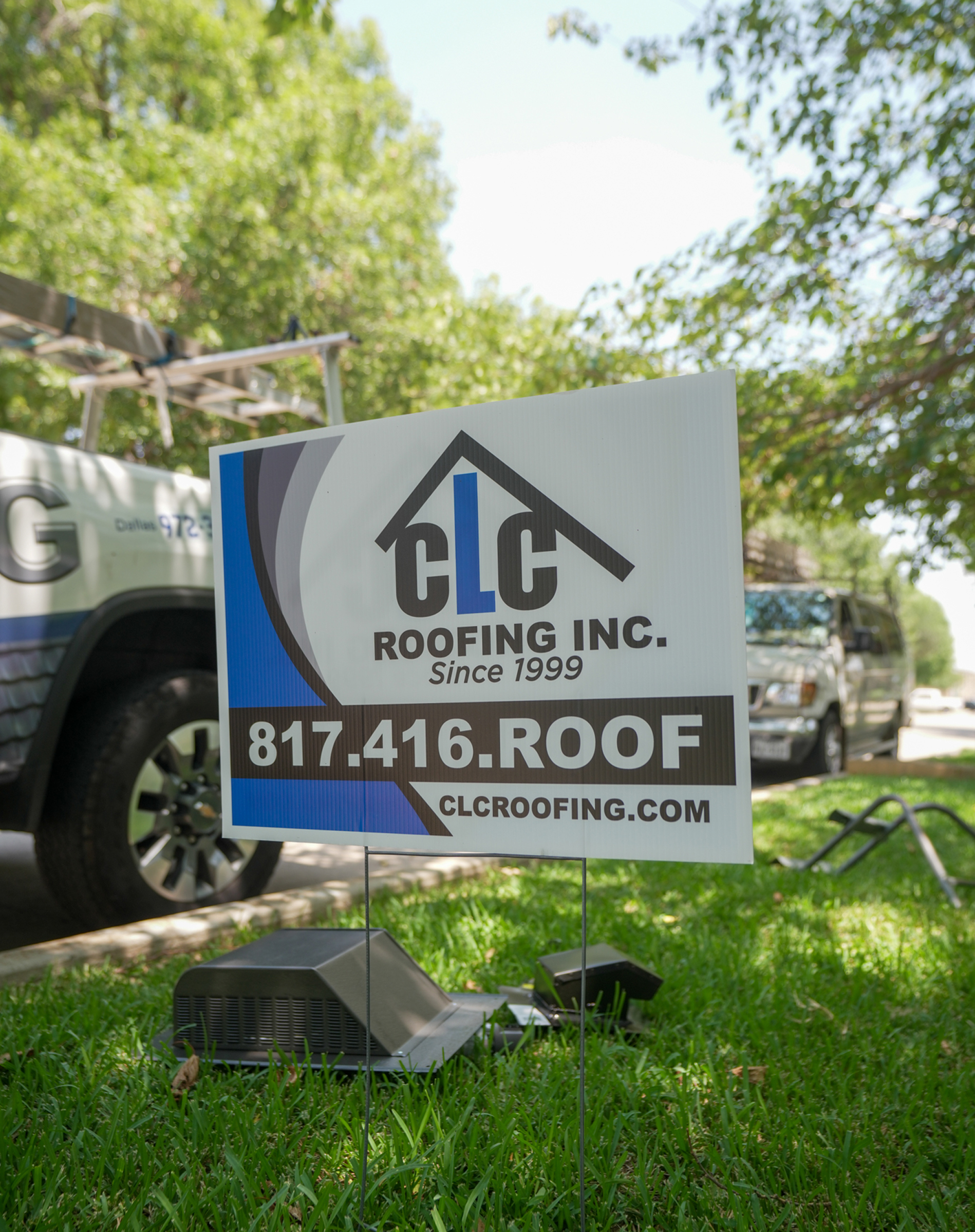 CLC Roofing yard sign with company logo and contact number in a residential lawn, Southlake TX
