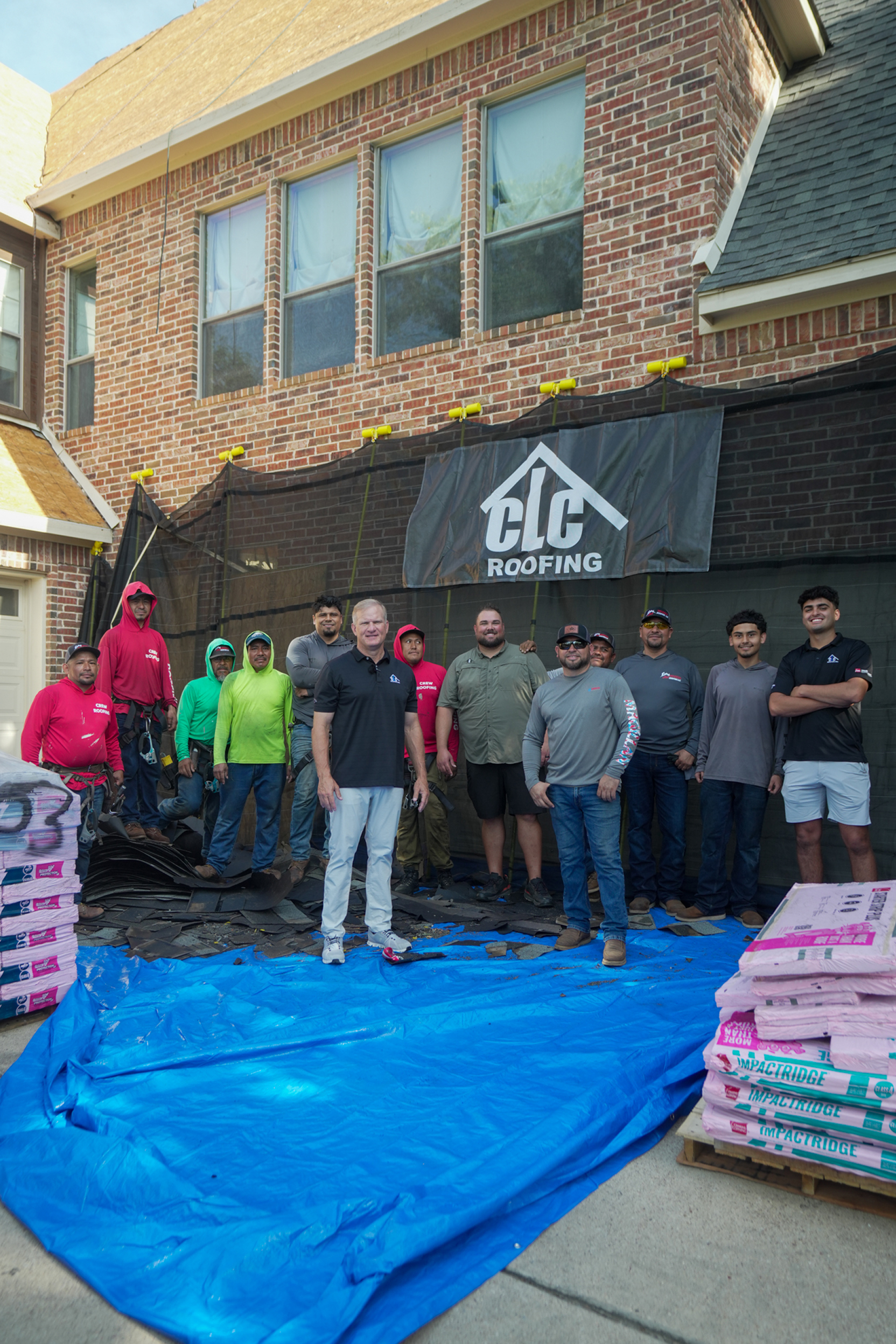 CLC Roofing crew and owner Chad Cross on job site preparing for roof installation in Southlake TX