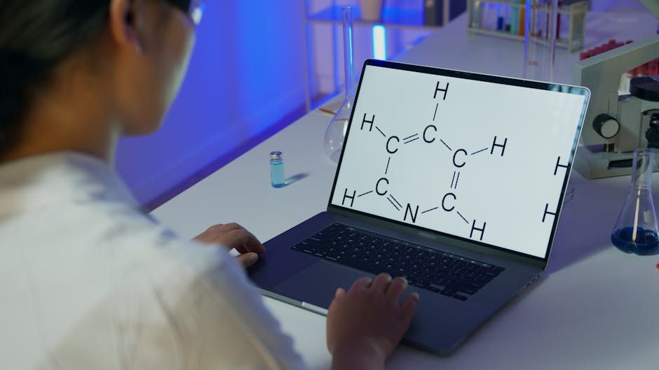 scientist looking at a computer model of a molecule - food allergy breakthrough scientist looking at a computer model of a molecule - food allergy breakthrough