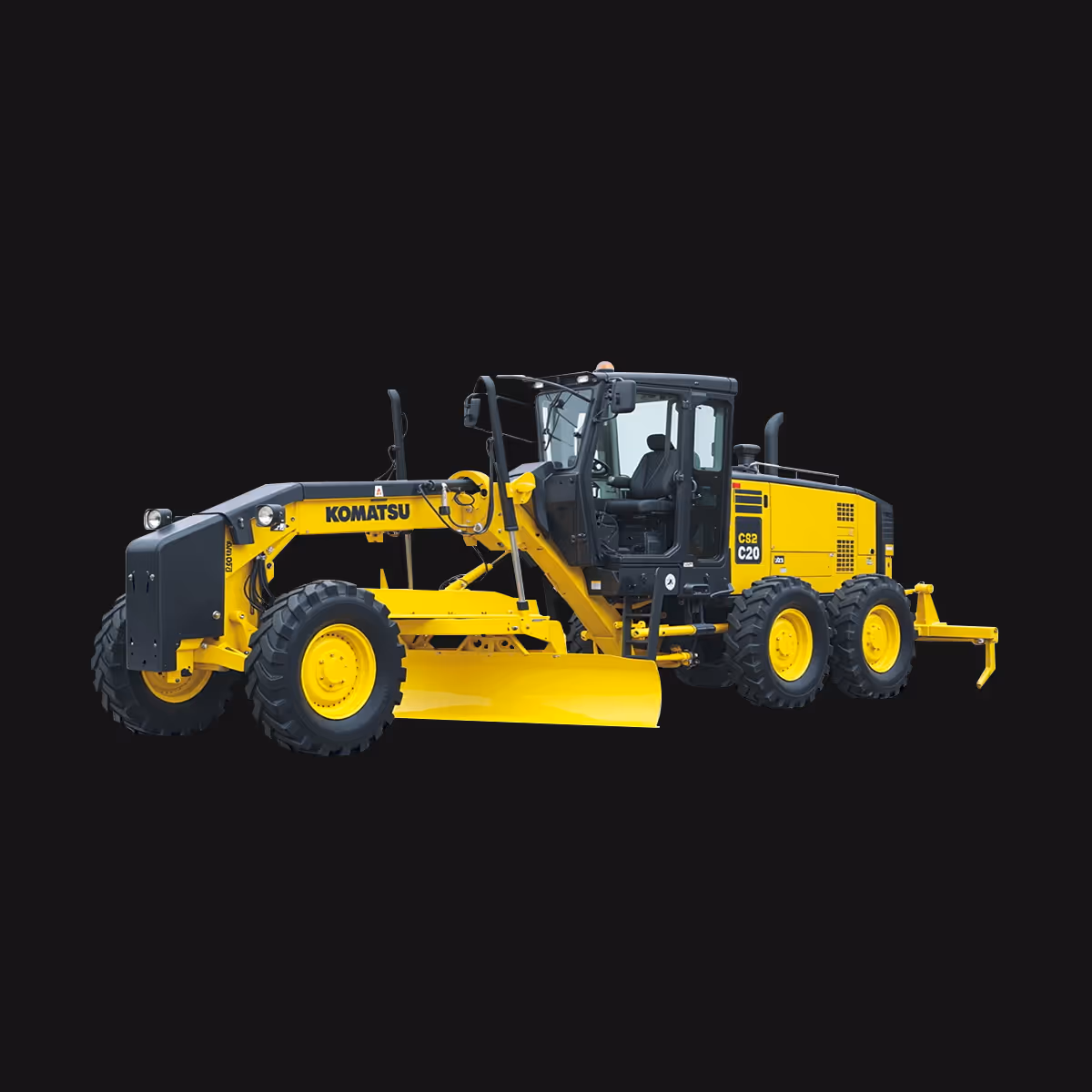 Yellow Komatsu motor grader with large tires and an enclosed cabin on a black background.