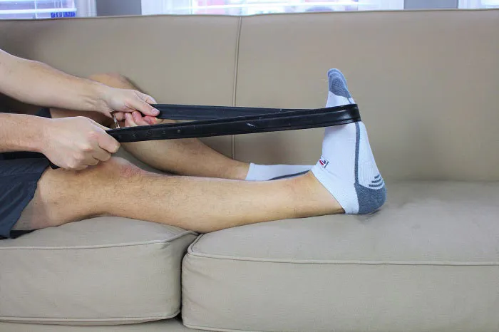 calf stretch with belt knee straight