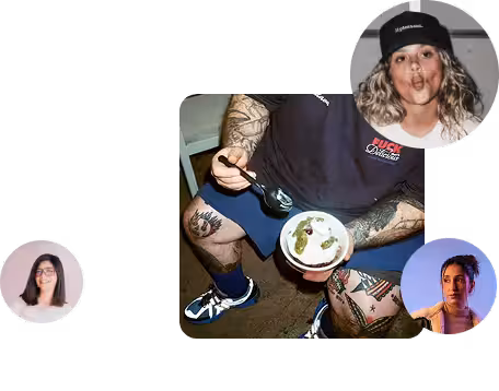 Tattooed person sitting and eating dessert with three small profile portraits of women around.