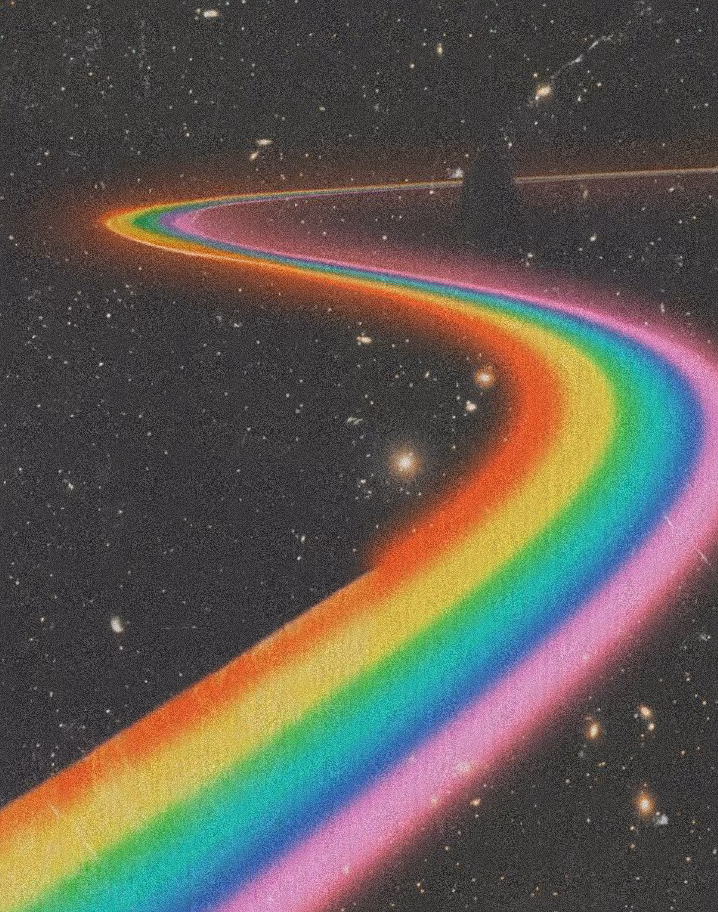 A winding rainbow path glowing against a starry night sky background with scattered stars and galaxies.
