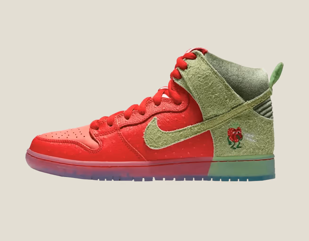 Side view of a red and green Nike high-top sneaker with a textured swoosh and smiling strawberry logo.
