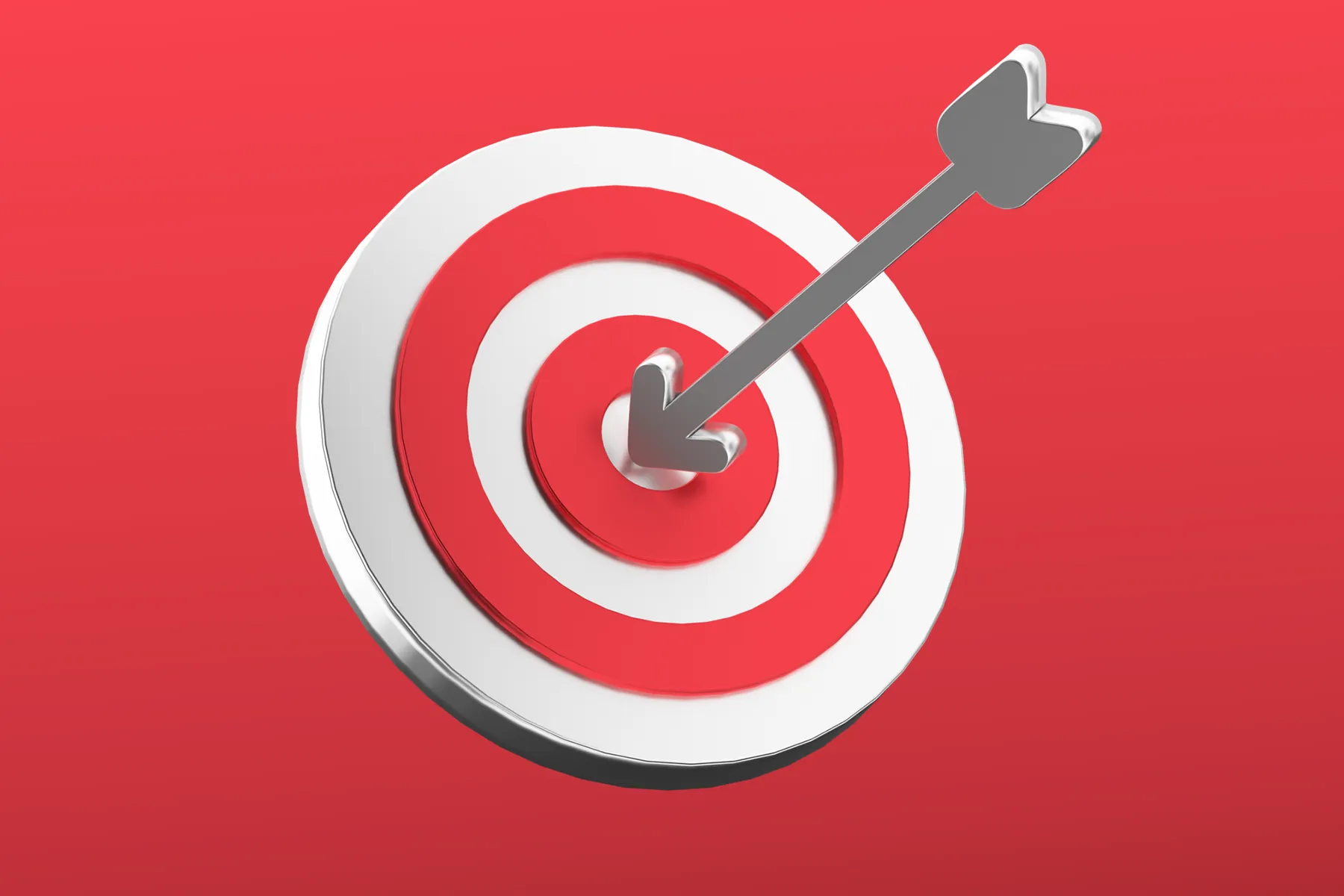 A 3D rendered red and white bullseye target with a metallic arrow piercing through the center, set against a bright red background, symbolizing precision and hitting goals.