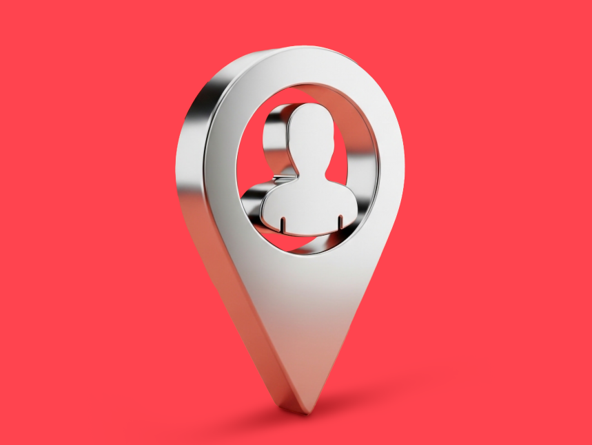 3D silver map pointer icon with a person symbol inside on a red background.