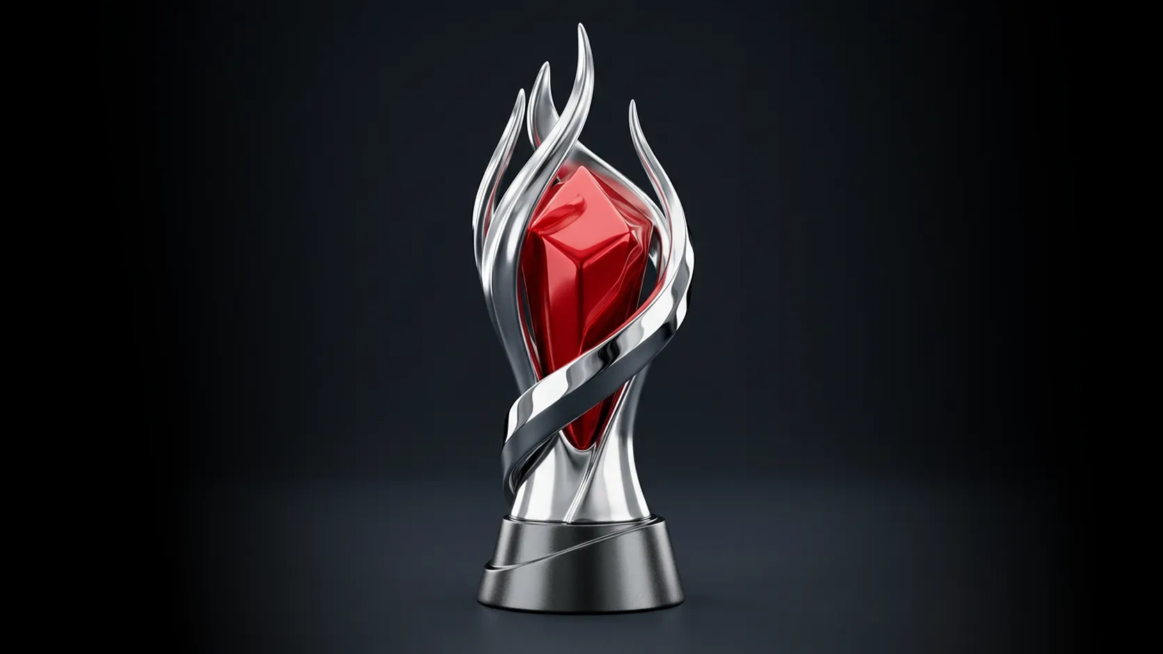 A sleek, contemporary trophy centered on a dark studio background. The award consists of a central, vibrant red crystal with sharp geometric facets, enveloped by elegant, curved metallic silver tendrils that mimic the shape of open flames. The structure sits on a circular, dark gray metallic base.