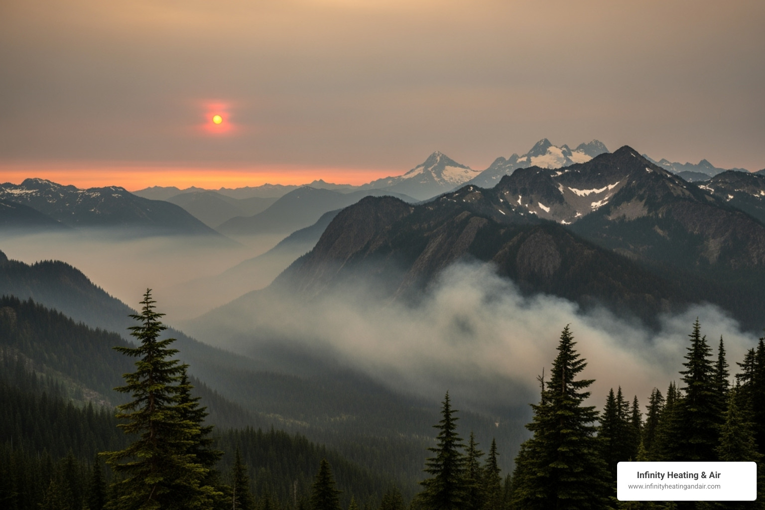 Smoky mountain landscape at sunset highlighting air quality issues in Washington, with visible haze from wildfires.
