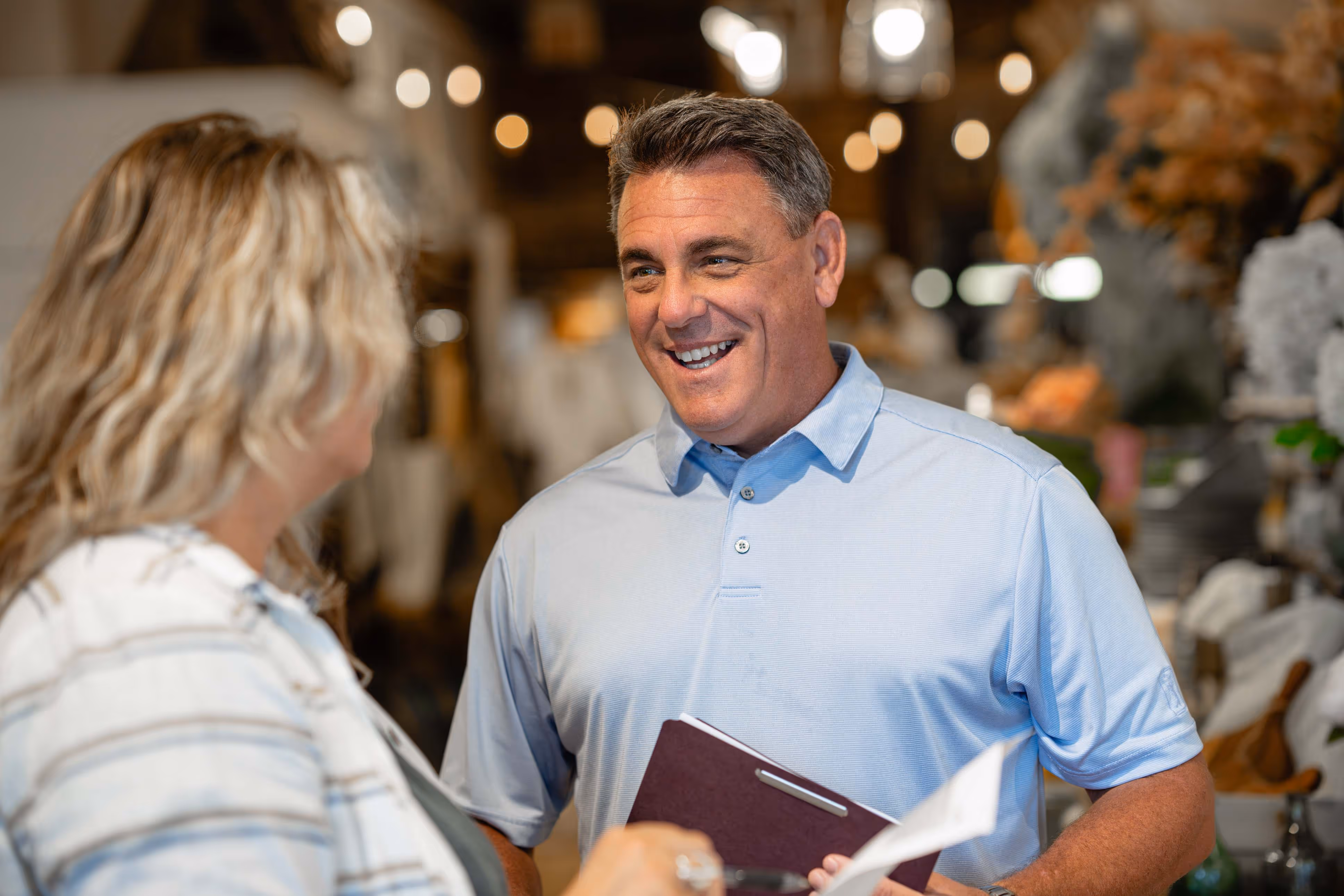 Job Developer working with a local business owner to identify their hiring needs