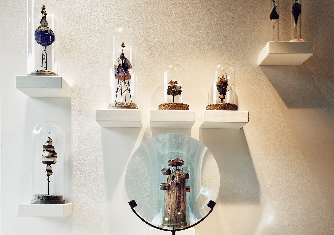 Artist Michael Davydov presenting his unique miniature sculptures during an art exhibition gallery event
