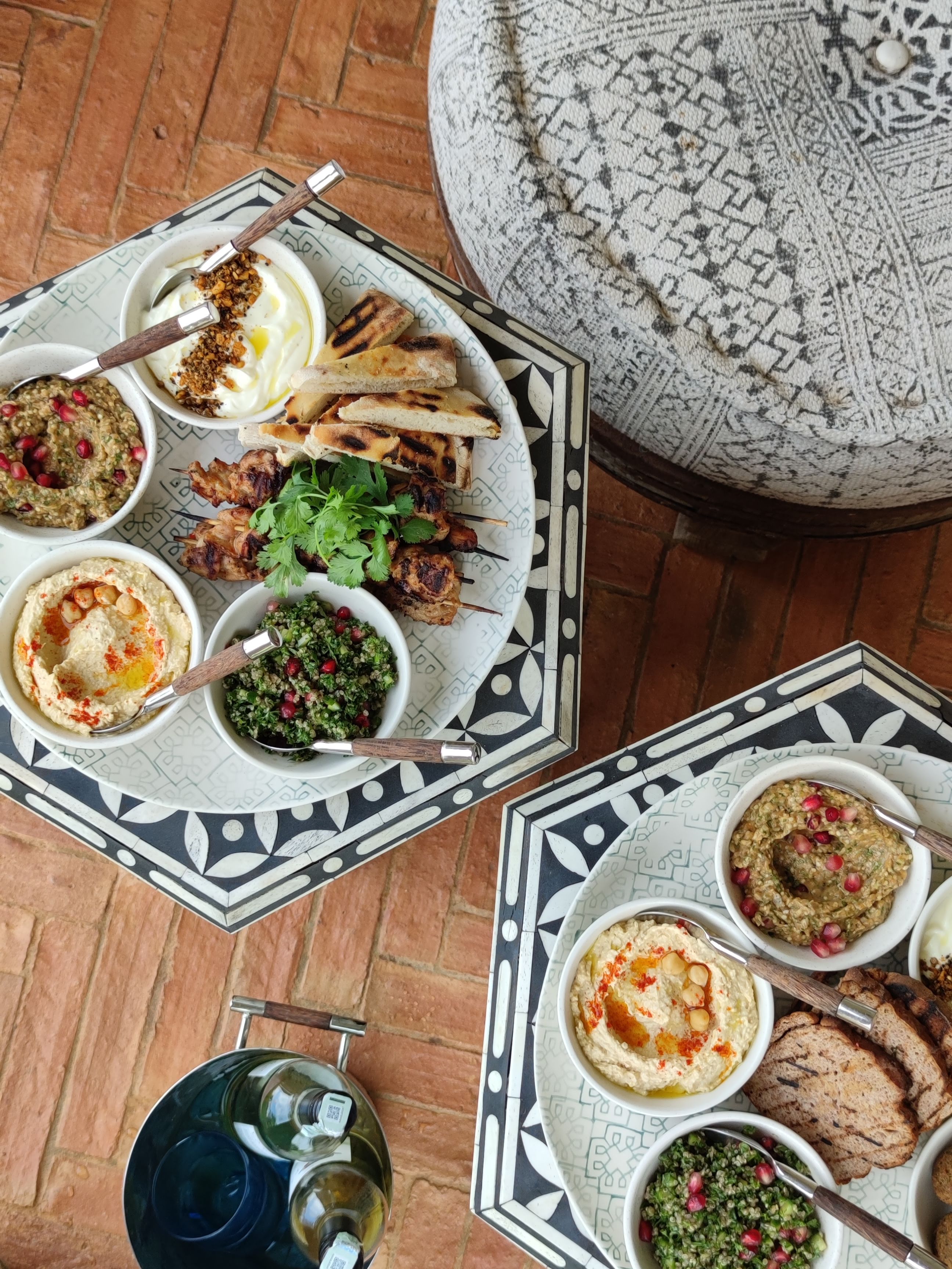 Mezze platters of hummus, tabbouleh, flatbread and grilled skewers at Malabar Hill
