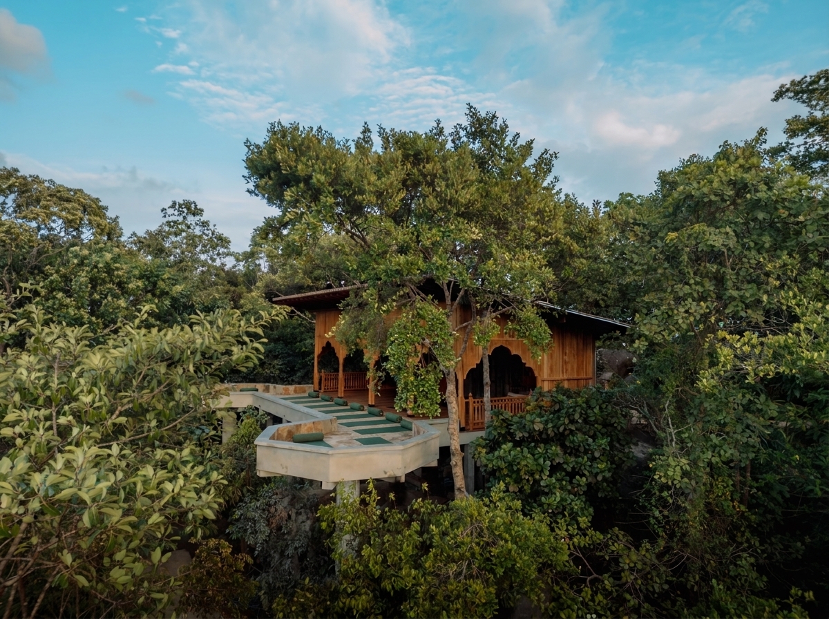 The treetop yoga pavilion at Malabar Hill, mats laid out on its open deck above the jungle