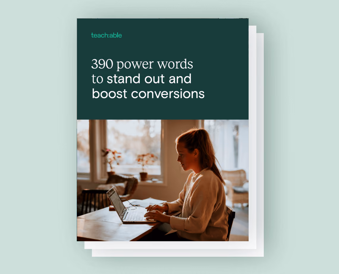 Book cover with text '390 power words to stand out and boost conversions' and a woman typing on a laptop.