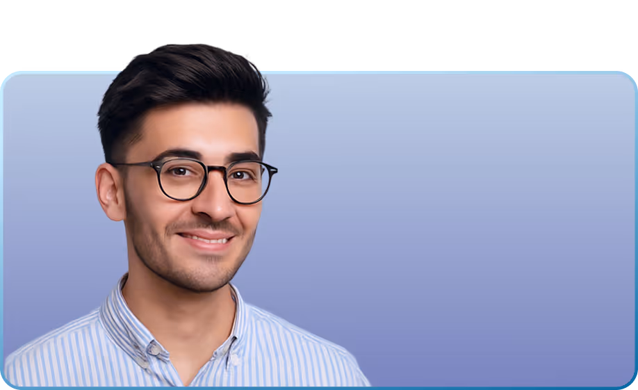 Portrait of a young smiling man with glasses wearing a striped shirt