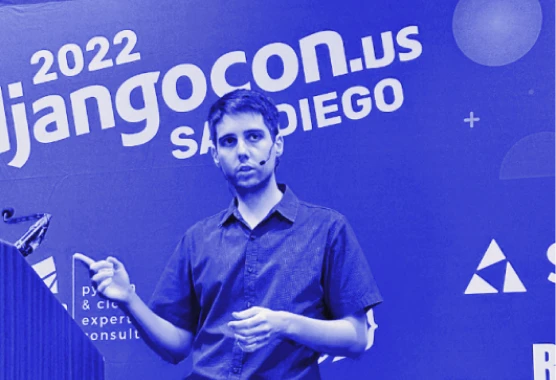 Flávio Juvenal presenting at DjangoCon 2022