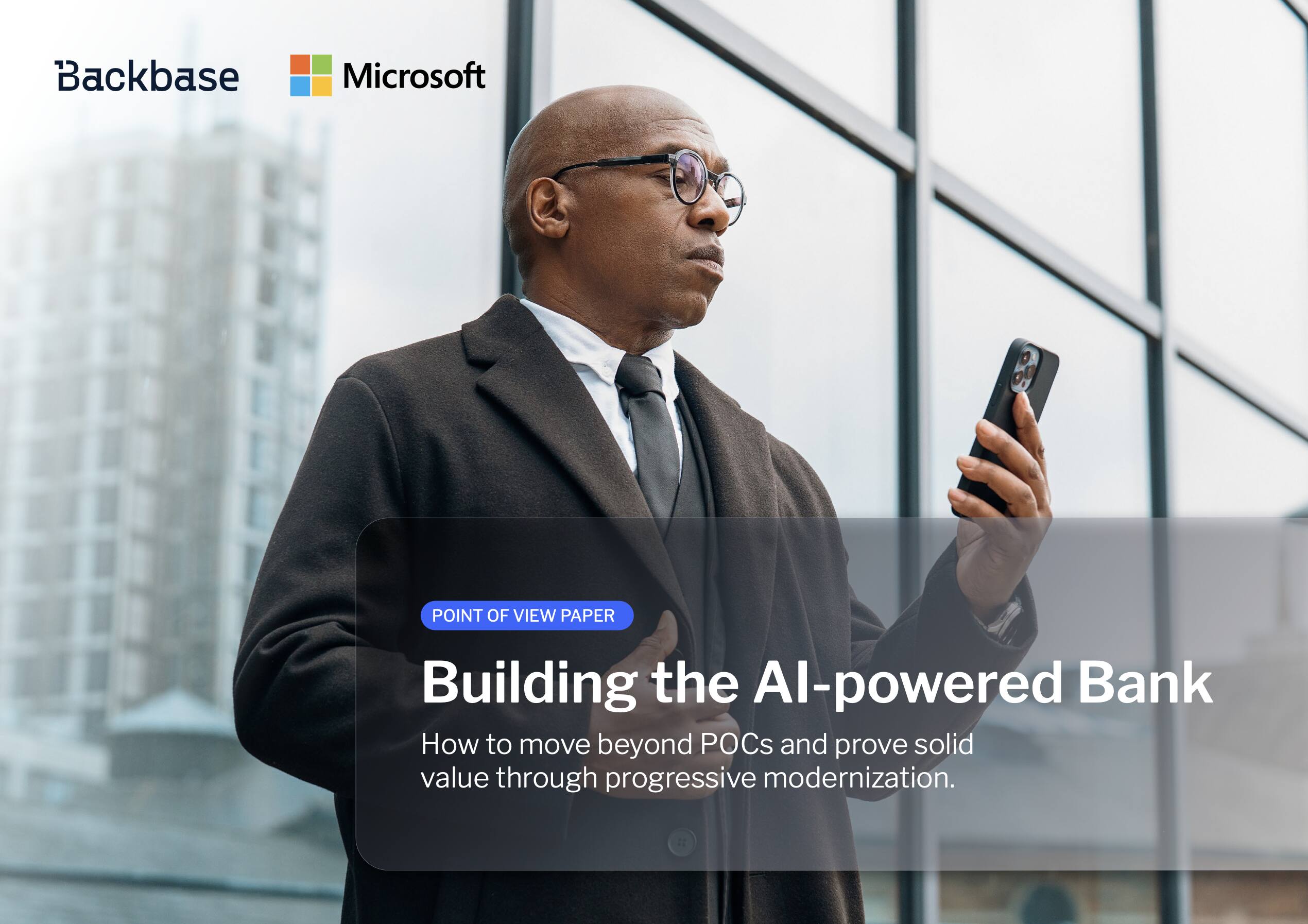 Business man holding a phone, text-on-screen - Building the AI-powered Bank How to move beyond POCs and prove solid value through progressive modernization.