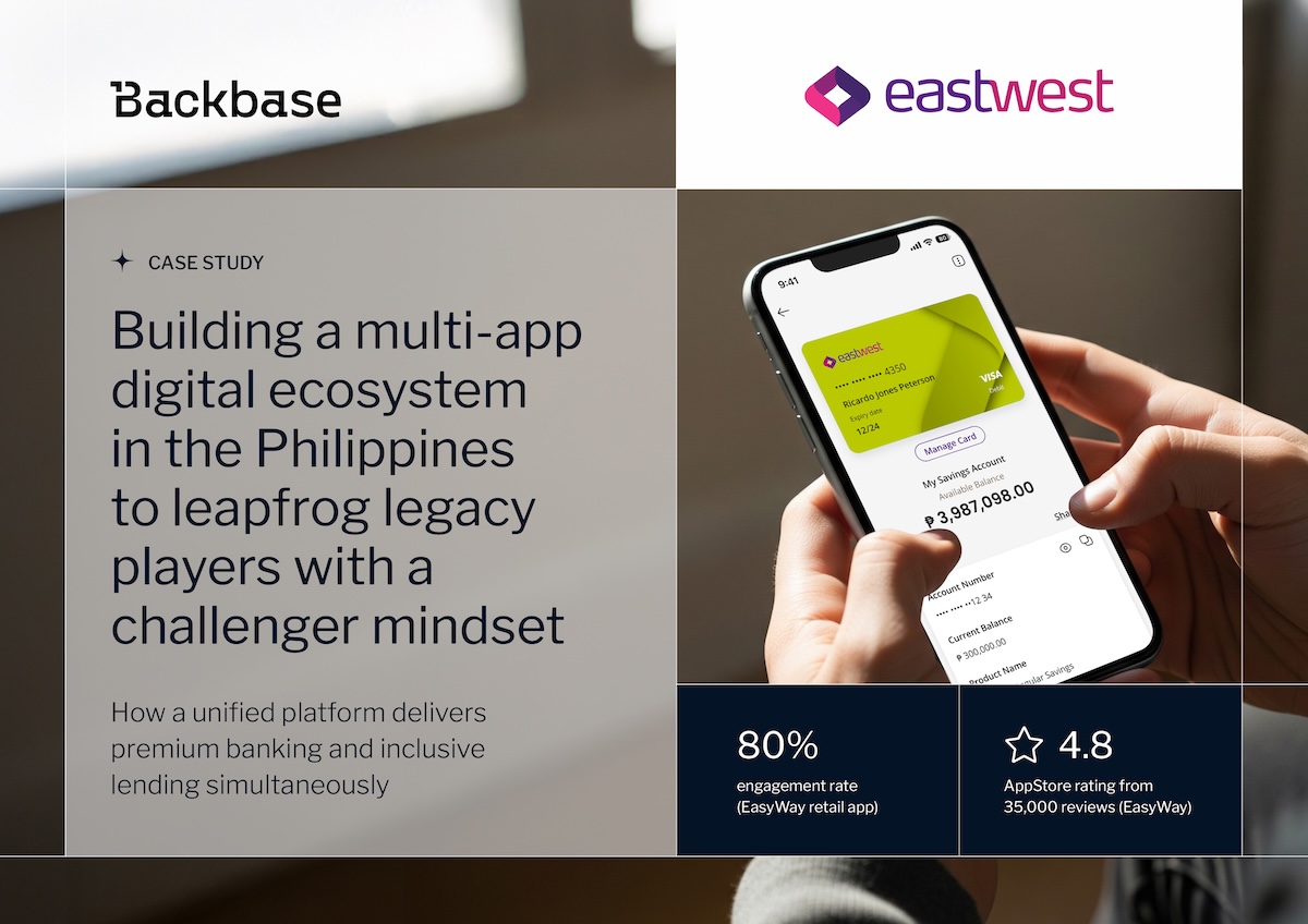 Hand holding smartphone displaying EastWest mobile banking app 