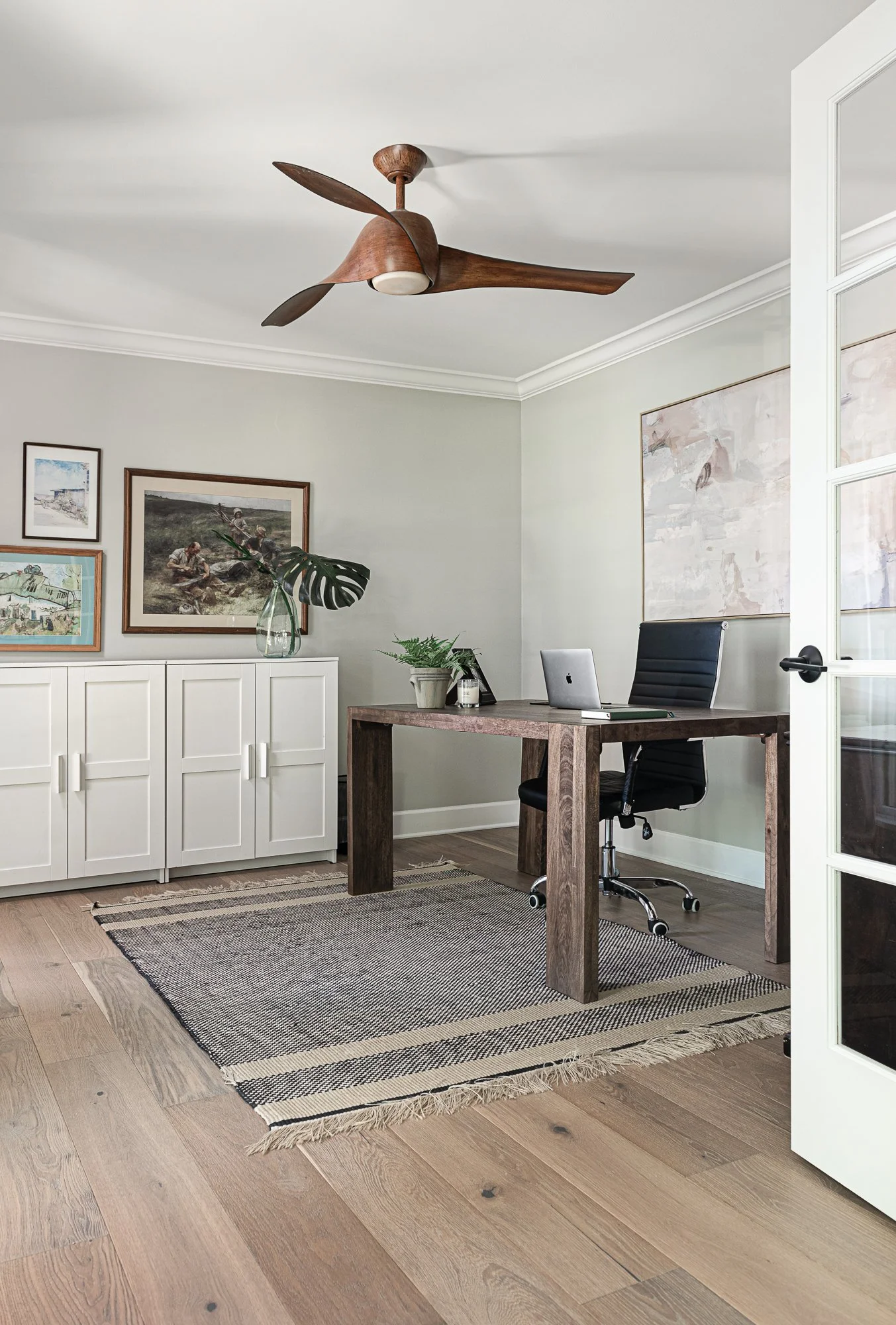 Dedicated home office with desk, built-in storage, and natural light added to a Naperville home