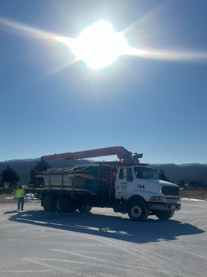 Boom truck placing materials