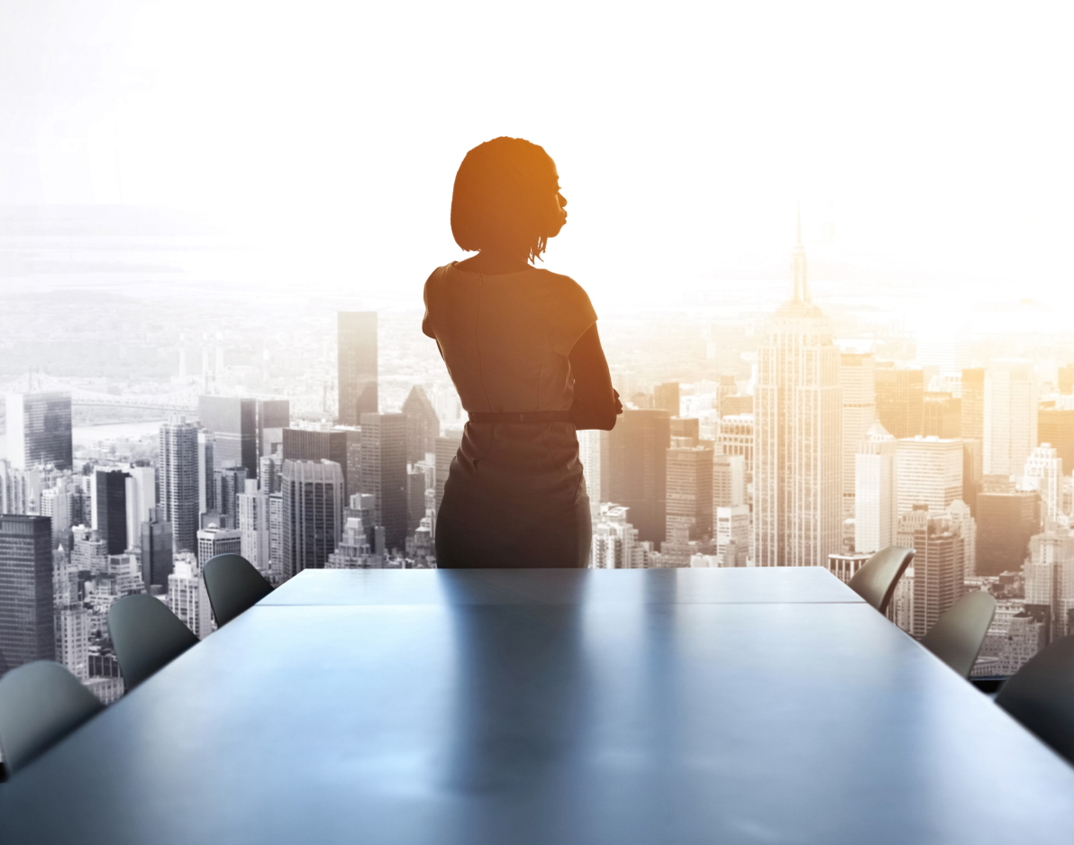woman with buildings in the background 