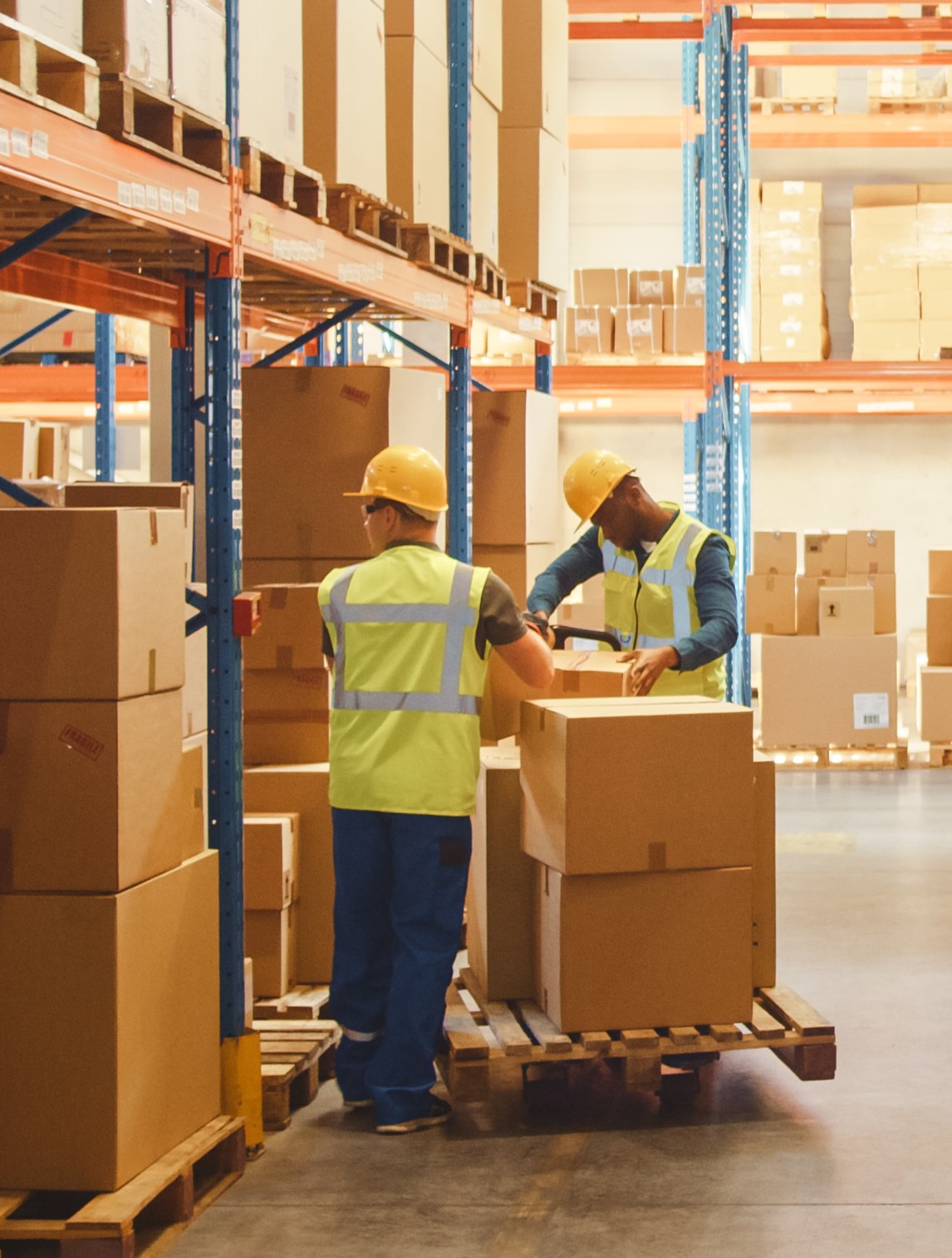 two men in a warehouse