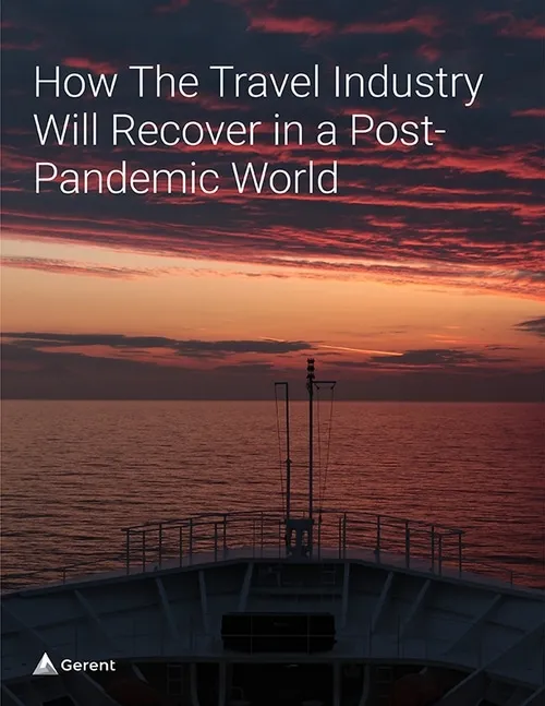 A view of the open ocean and sunset sky form the bow of a ship