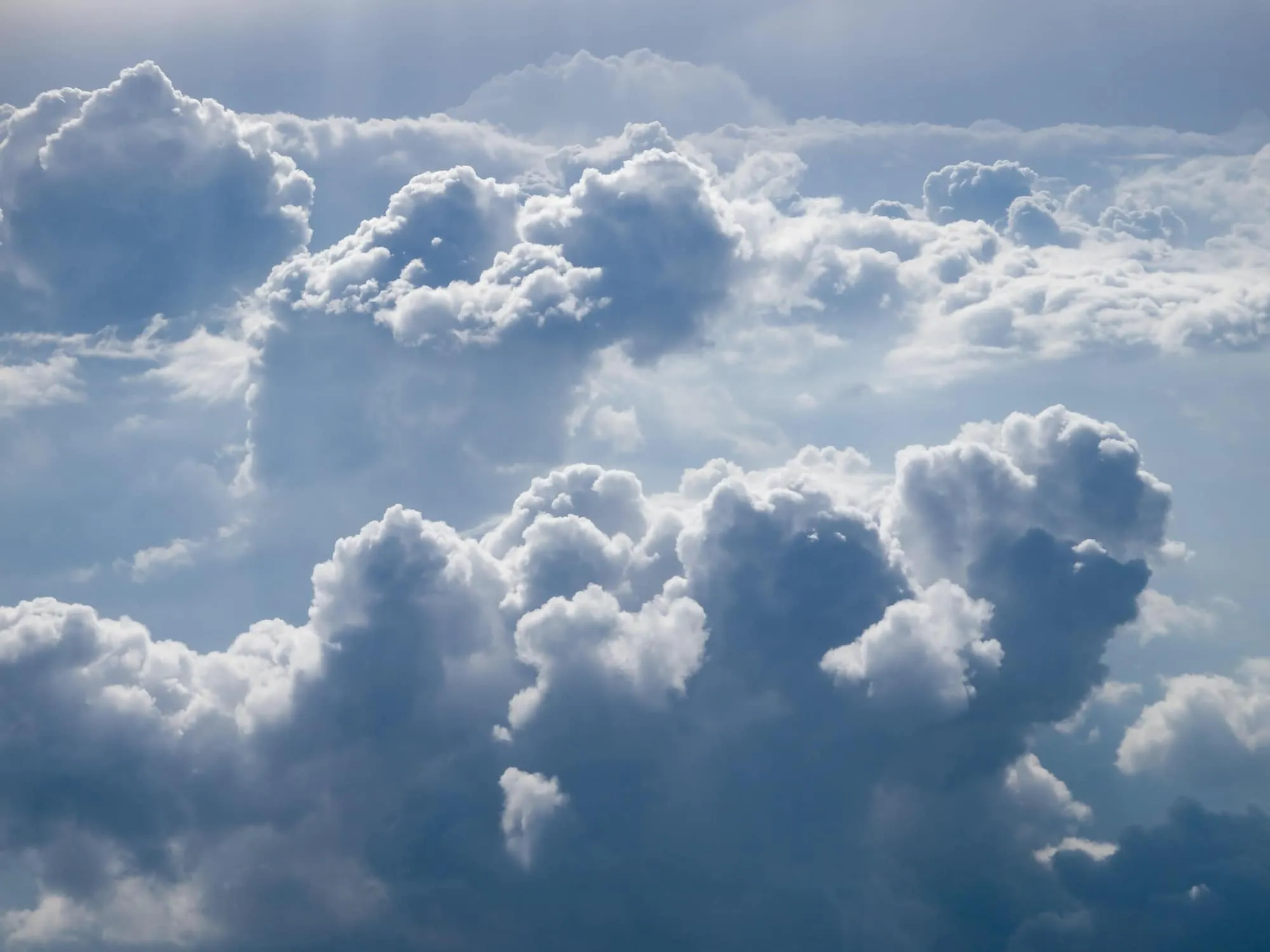 white clouds in a blue sky