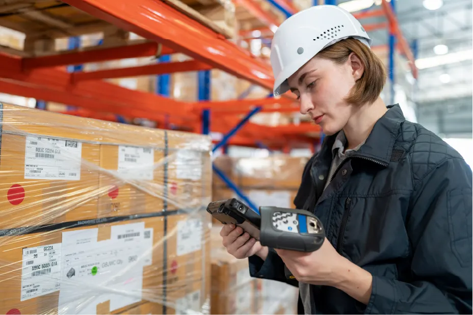Warehouse employee scanning products 