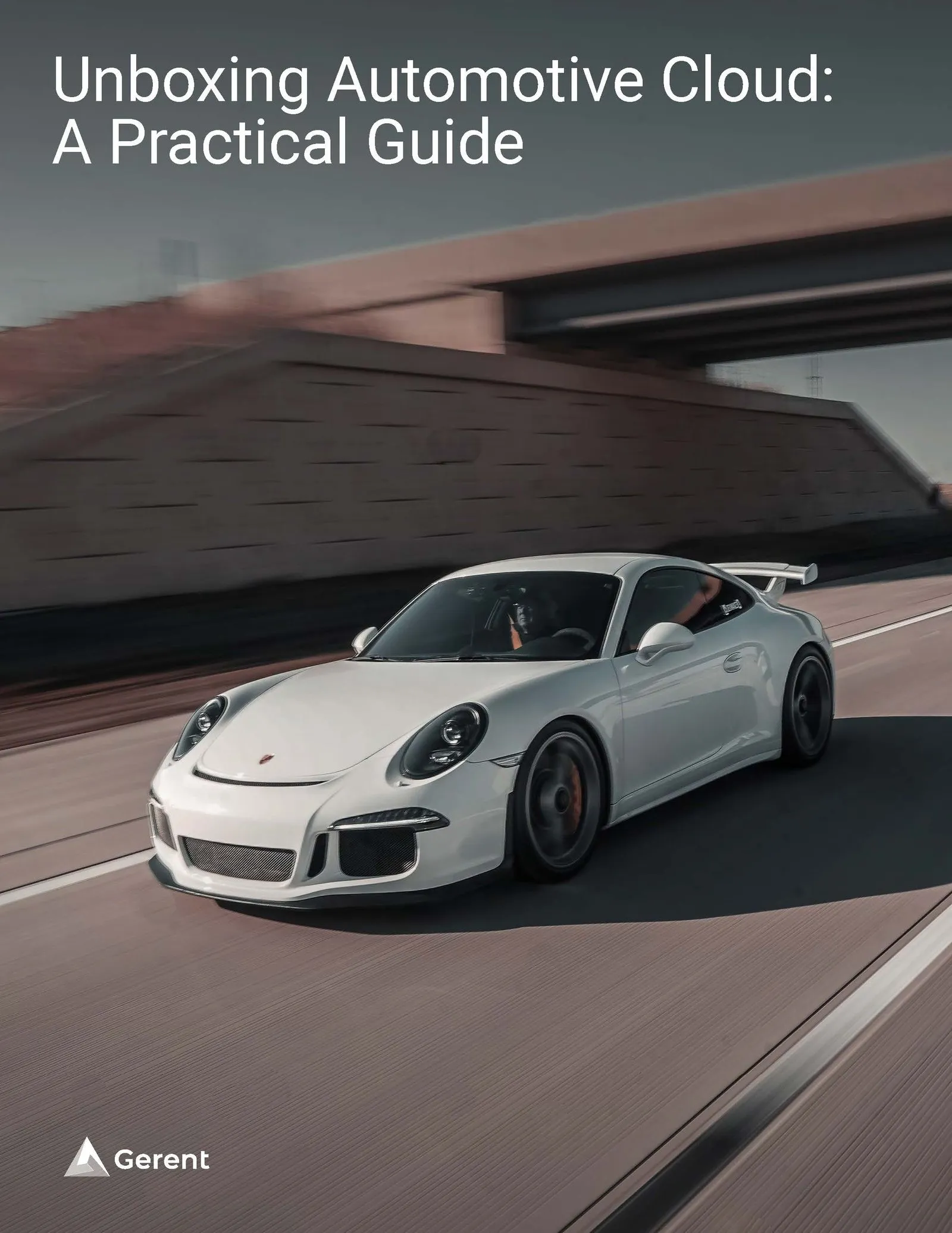 White car driving down the road