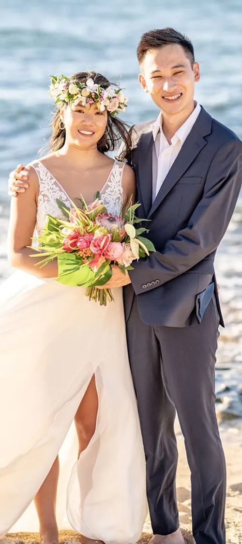 A newly wed on the beach.