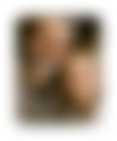 A blurry photo of a father and daughter