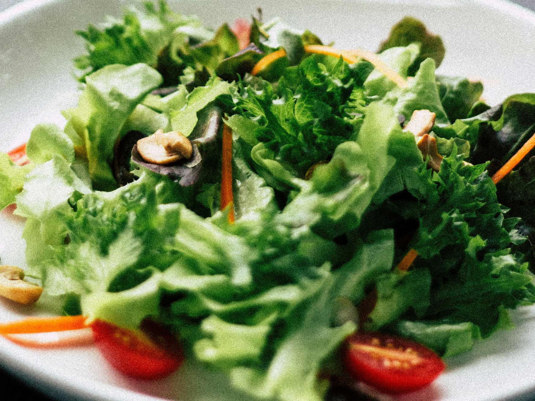 Close-up of a salad platter, showcasing various vegetables