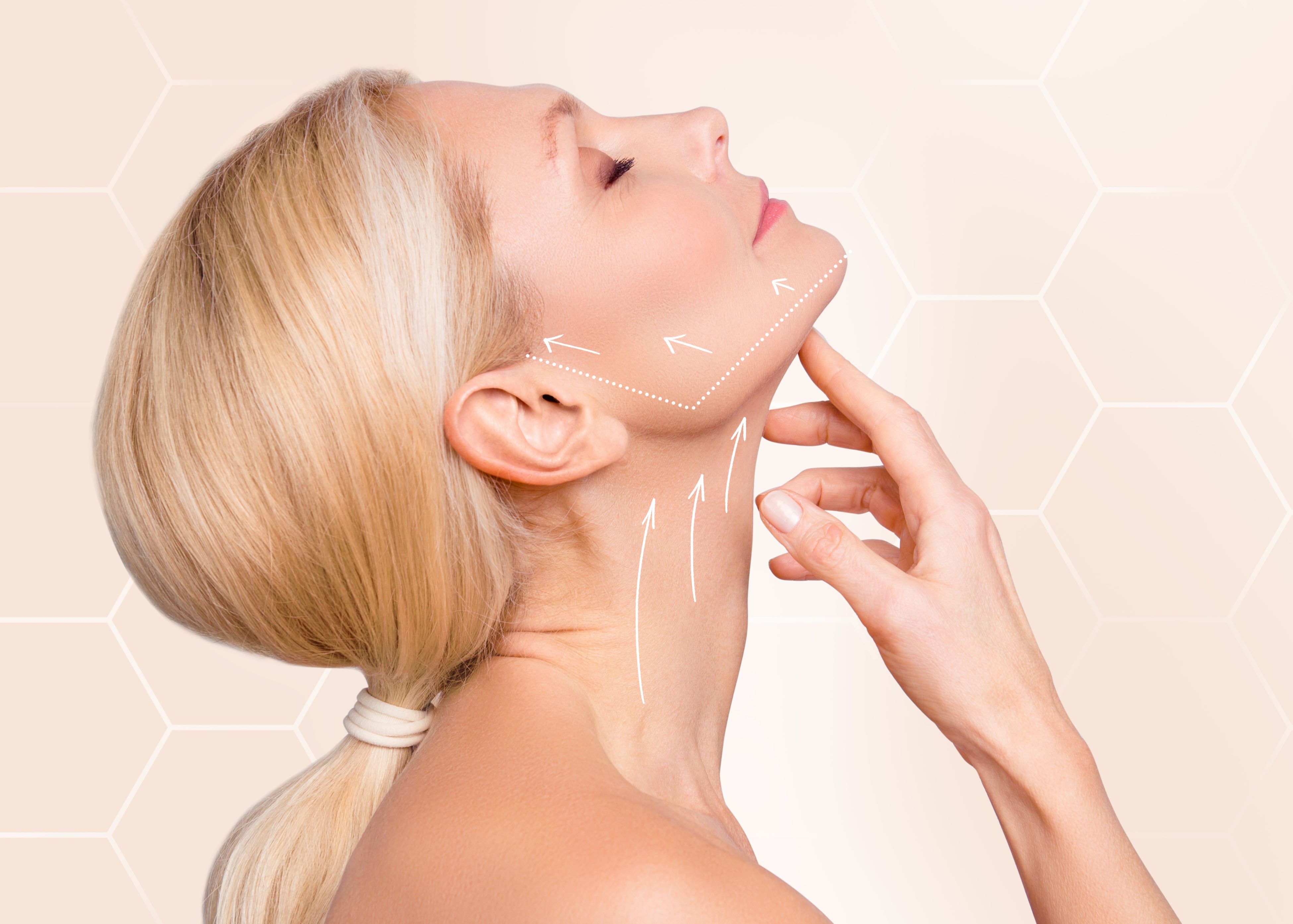 A woman with lines drawn on her face.