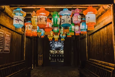 photo of assorted-color Chinese lanterns inside room