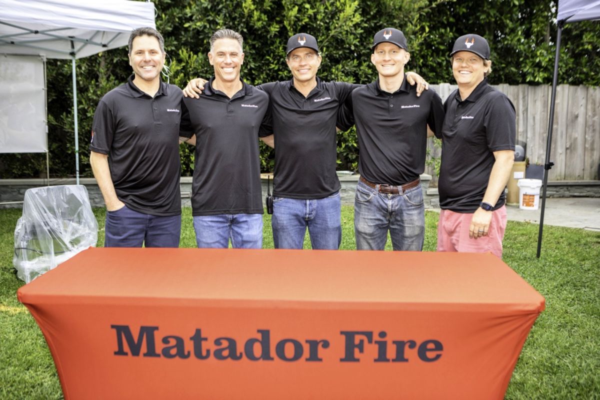 The Matador Fire team at a block party demo with active duty firefighters.