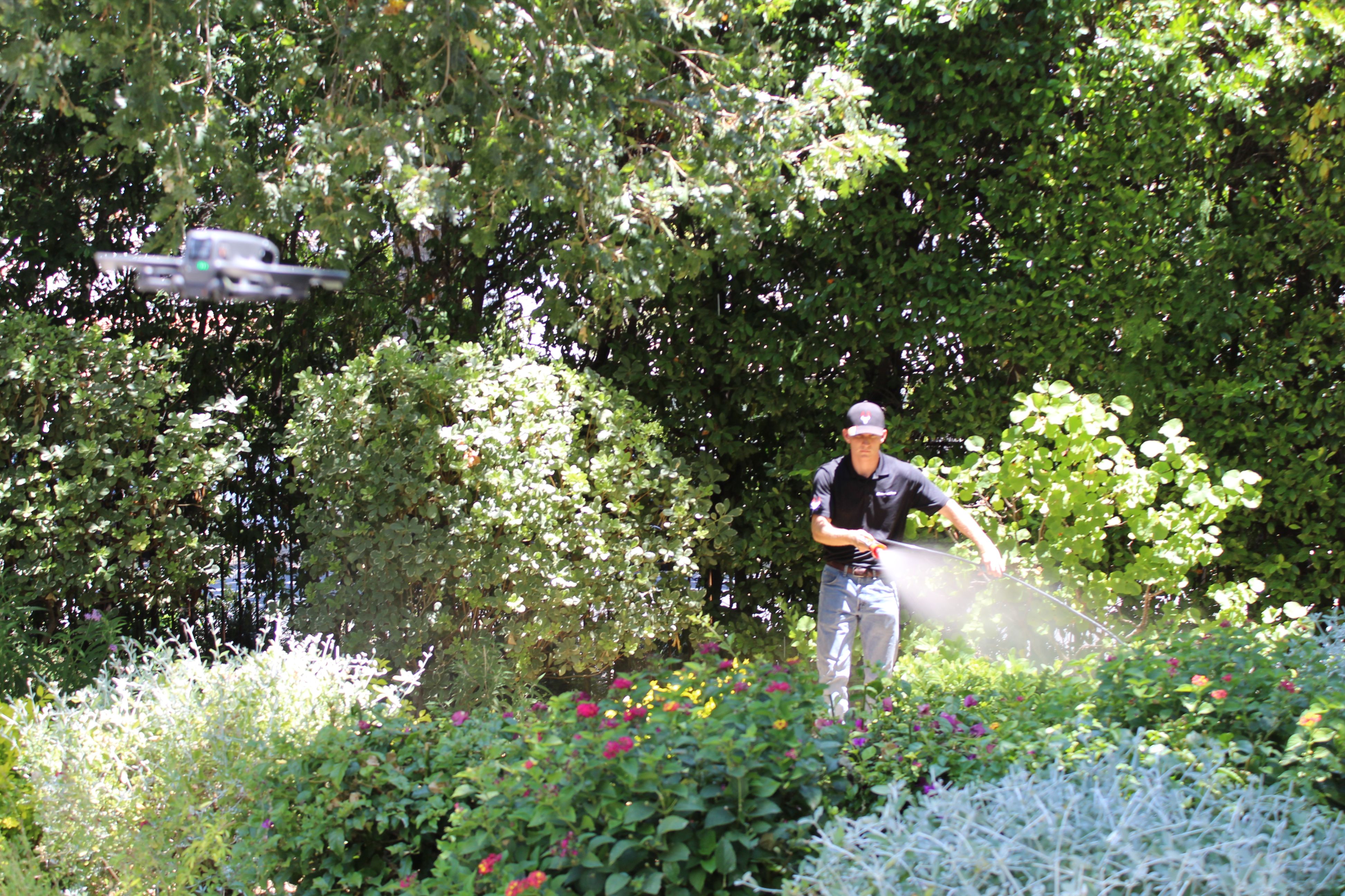 Matador Fire technician applying fire retardant with commercial applicator