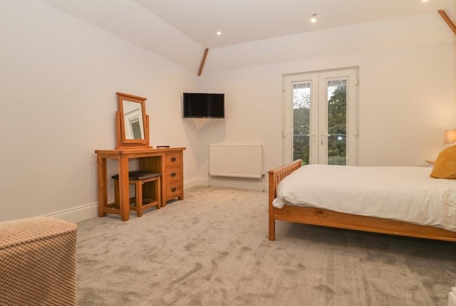 Bedroom featuring wooden furniture