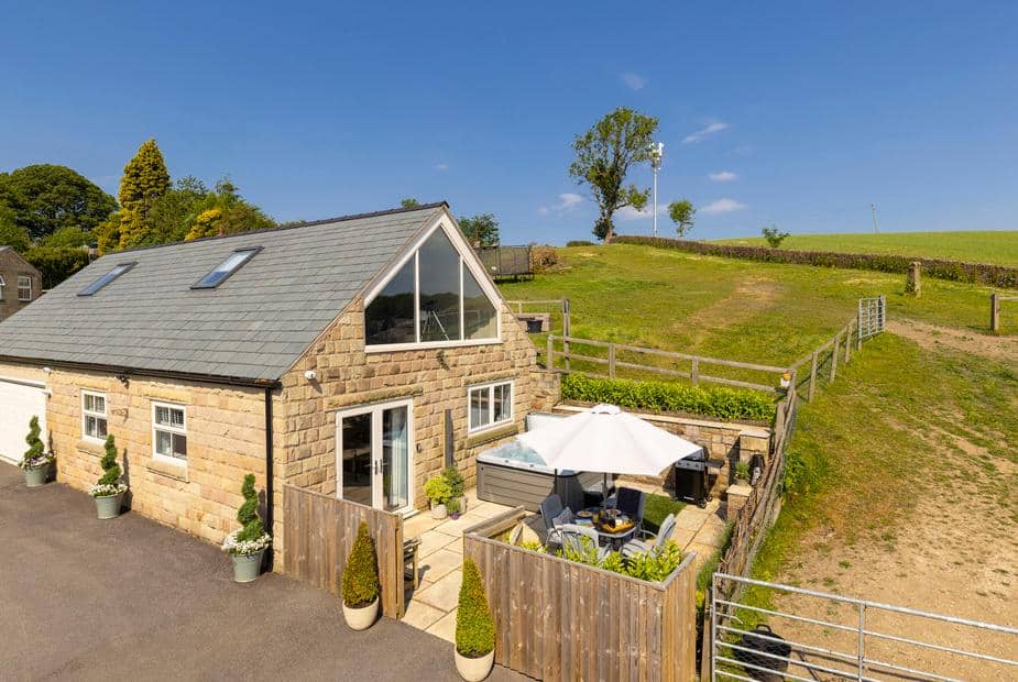 Walton House Cottage with enclosed patio, hot tub, and countryside views