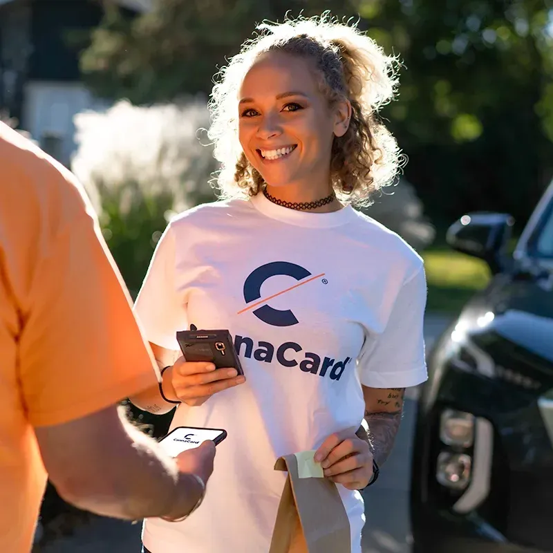 Delivery driver accepting CannaCard for payments