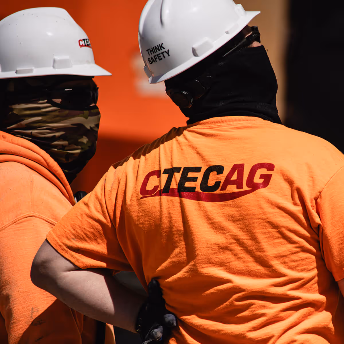 Some workers analyzing a job